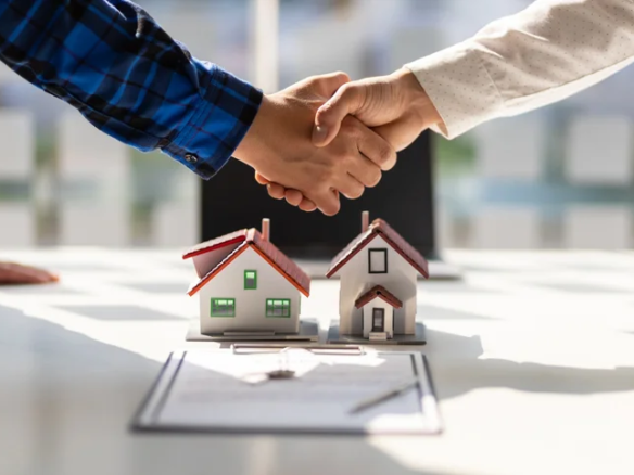 Real estate agent helping buyers purchase a home in Albuquerque
