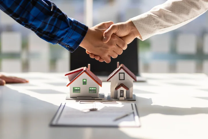 Real estate agent helping buyers purchase a home in Albuquerque